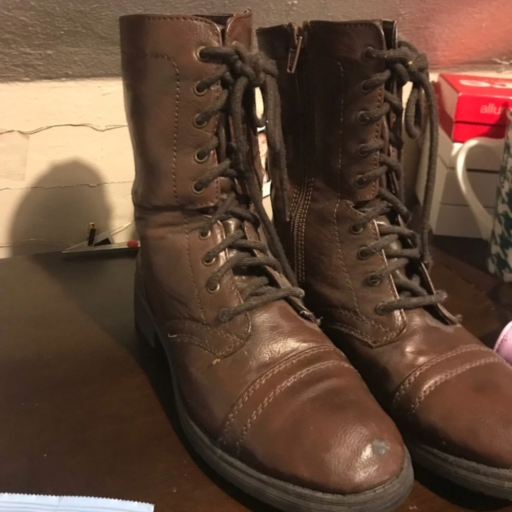 Brown combat boots.